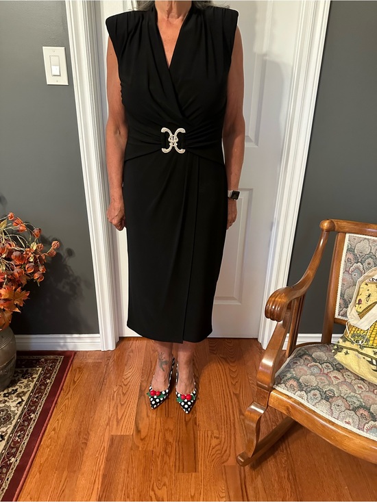 Joseph Ribkoff Dresses & Skirts - Elegant Black Twist-Front Midi Dress with Decorative Brooch. Never worn.